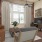 a living room with a couch and a tv